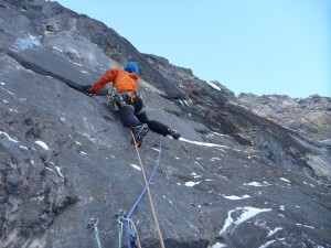 Nick doing some interesting things to leave the belay on pitch 4