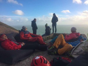 The team, chilling while we wait to be called to climb